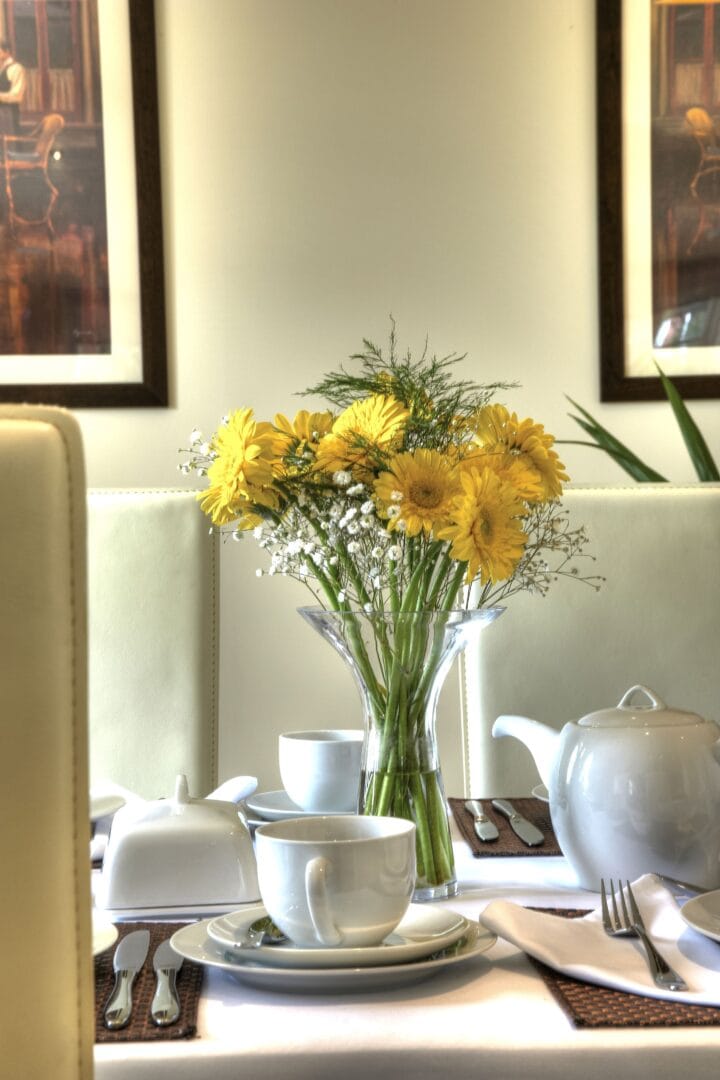 Yellow flowers in a vase.