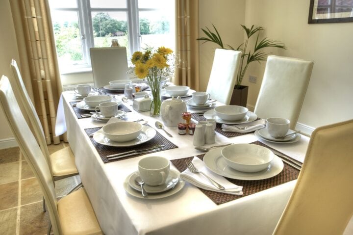 A white tablecloth on the table.
